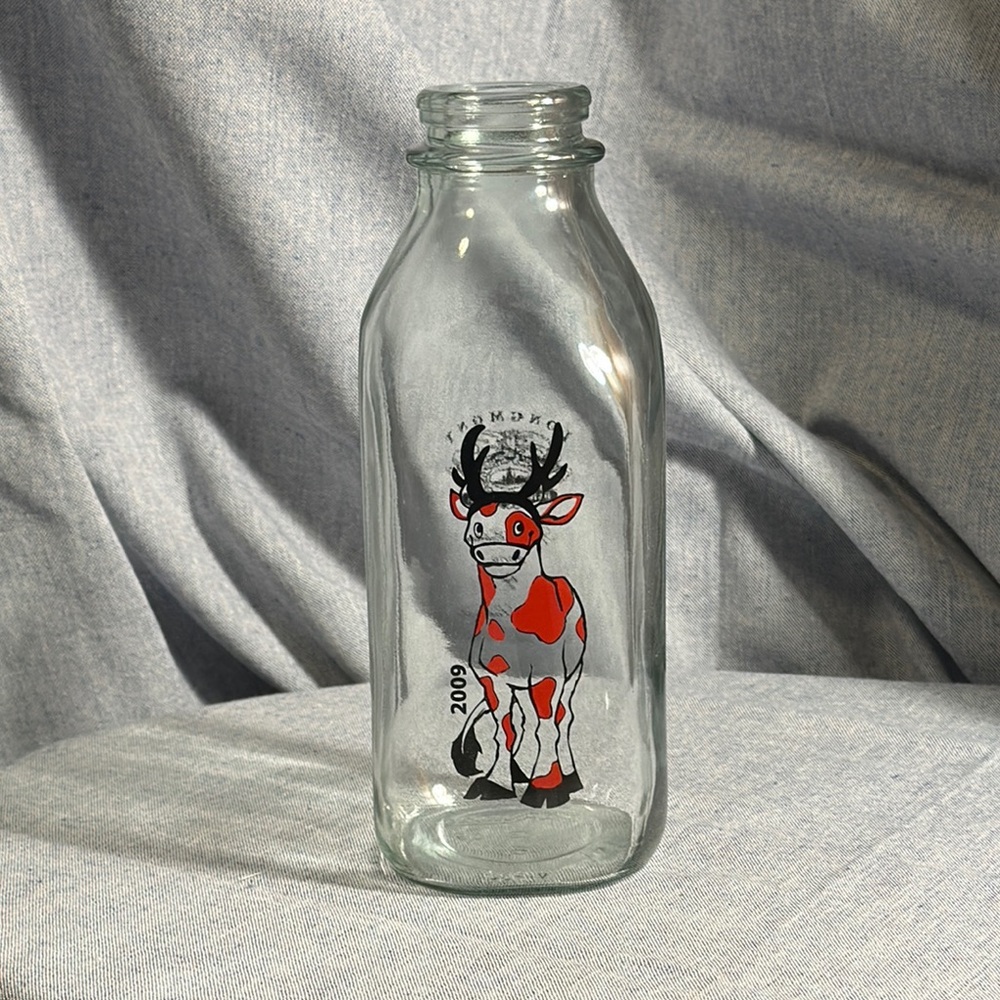 Stylized Red and Black Glass Art with Character Illustration
